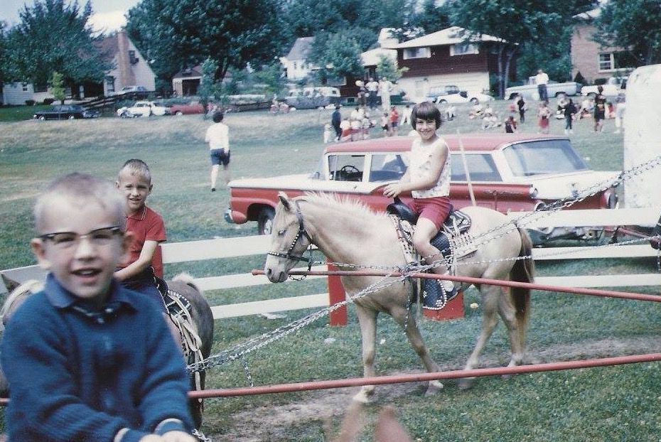 Riding ponies on July 4 in Westmoreland Park in the 1960s